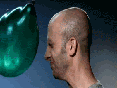 Head vs. water balloon (slow motion)