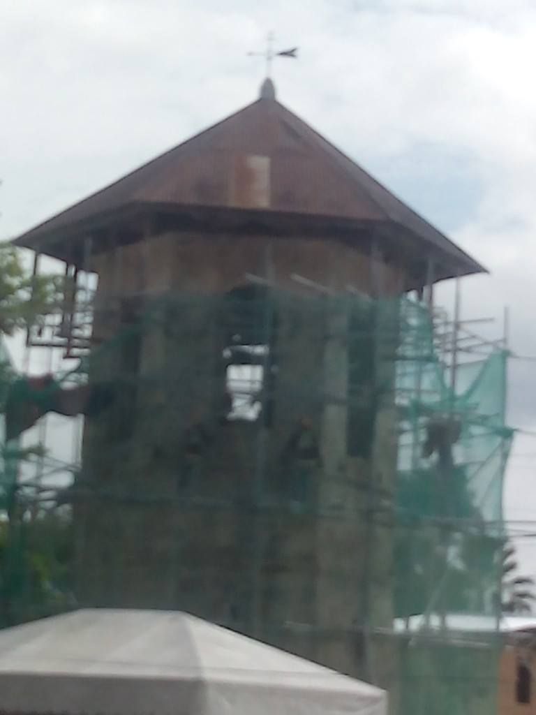Our Lady of Assumption Church in Dauis, Bohol, Philippines Structure being restored at the back of the Our Lady of Assumption Church in Dauis, Bohol, Philippines