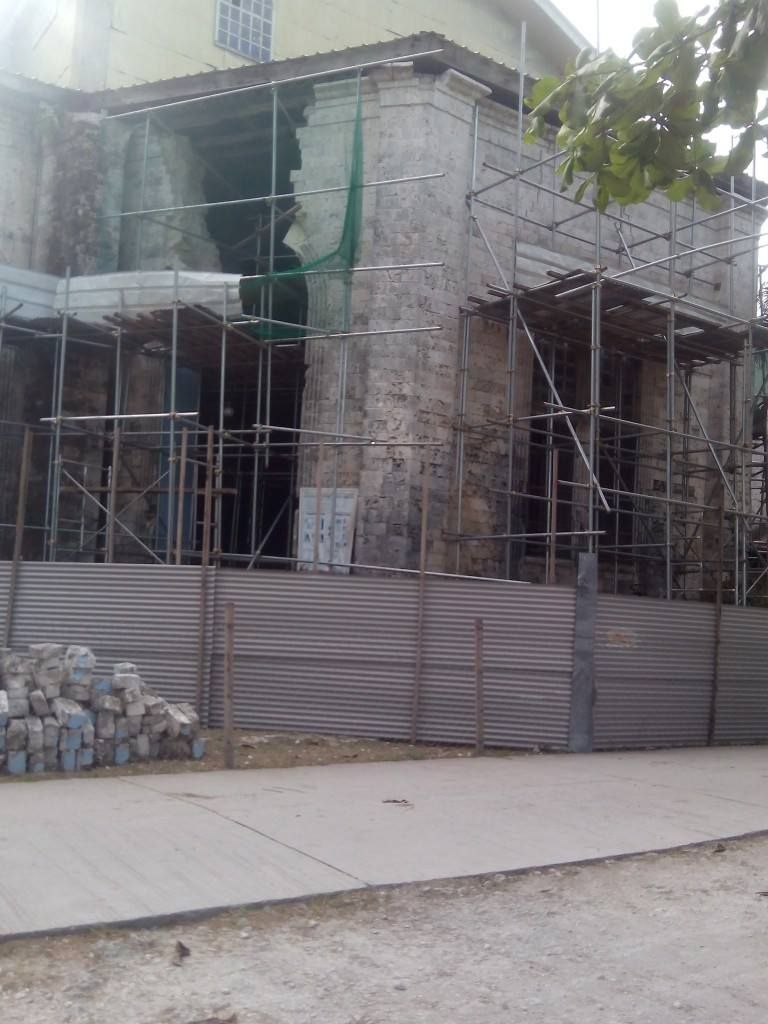 Our Lady of Assumption Church in Dauis, Bohol, Philippines Damaged exterior of the Our Lady of Assumption Church in Dauis, Bohol, Philippines
