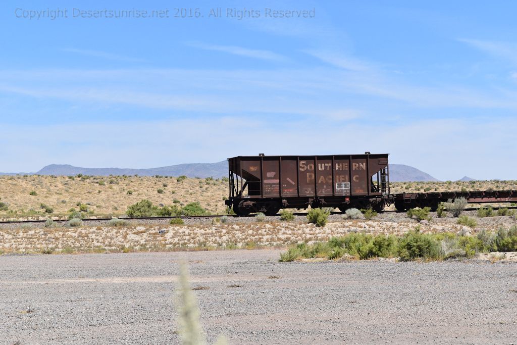 Southern Pacific hopper (gravel hopper) and flatbed car. photo Fort Churchill Road 065.jpg