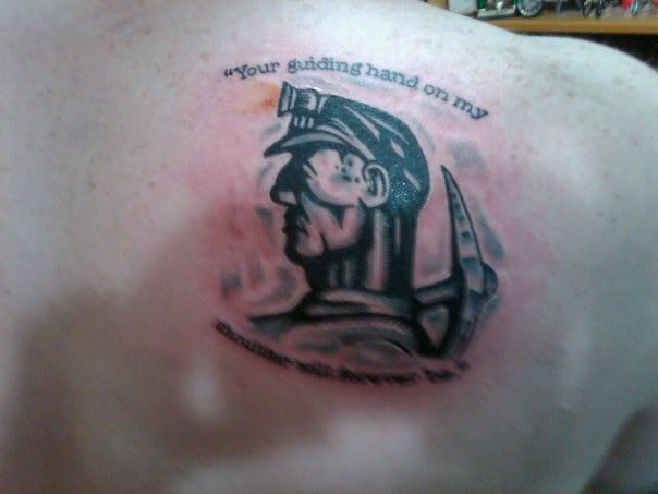 http://i38.photobucket.com/albums/e145/munster_ek/tattoo.jpg